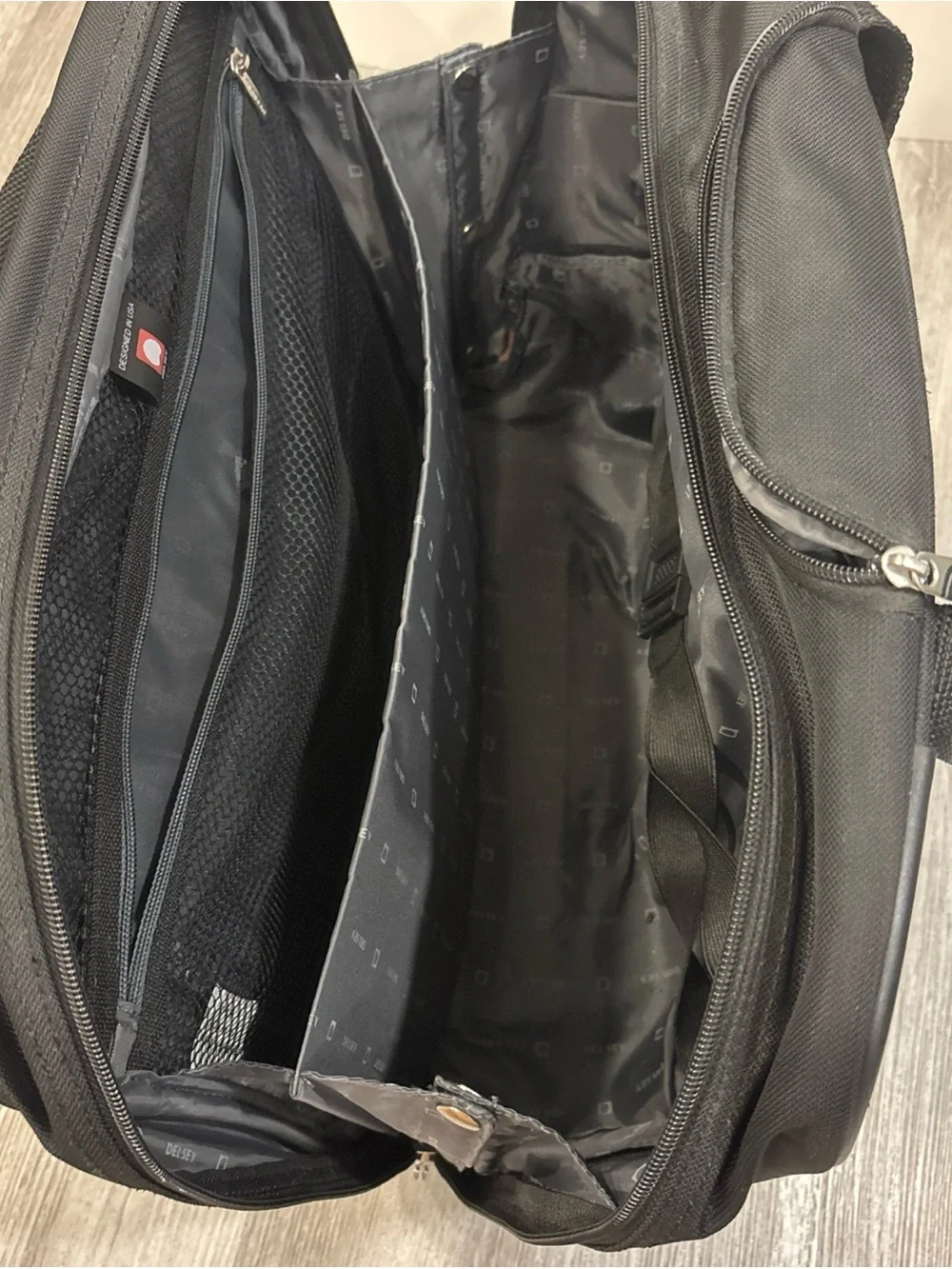 Delsey Paris black travel carryon with wheels luggage suitcase travel
